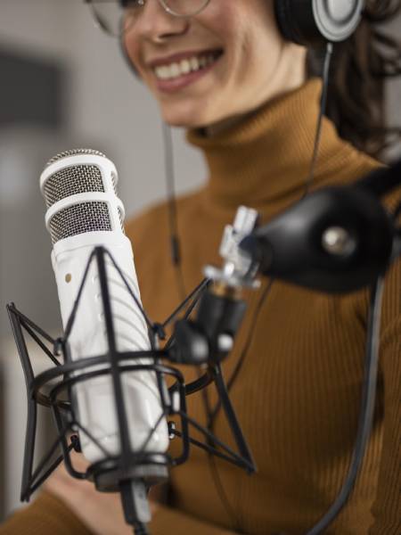 A Podcaster on Microphone